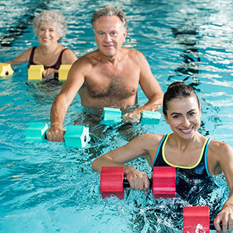 Adults exercising in the swimming pool